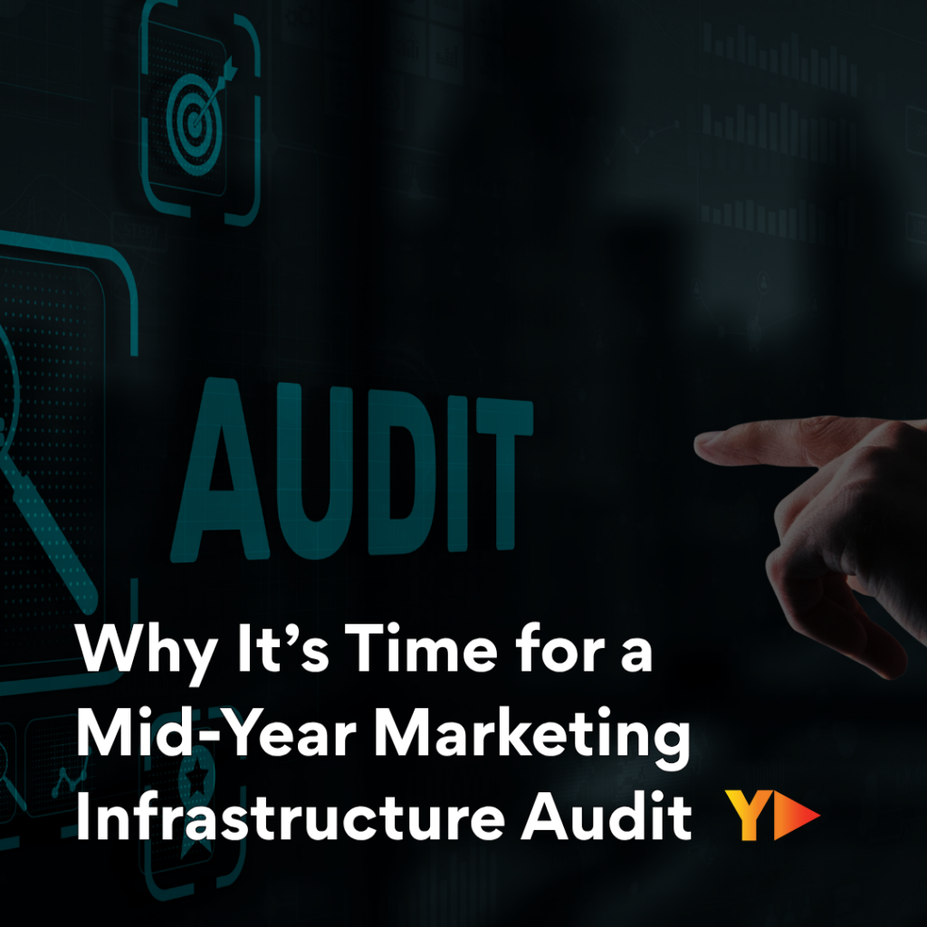 A clean, modern digital graphic featuring the text "Why It's Time for a Mid-Year Marketing Infrastructure Audit." The background shows a stylized, abstract dashboard with interconnected nodes, gears, and magnifying glasses, symbolizing a data and technology health check.